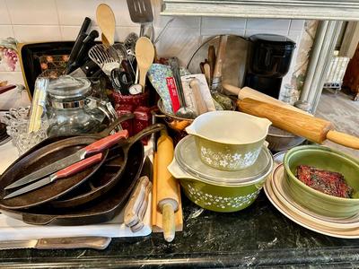 Kitchen Lot 11 - Right side of Stove top display includes Pyrex & Cast Iron