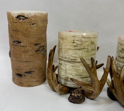 Sale Photo Thumbnail #178: 4 resin antler candle holders and 8 candles: the taller 2 are battery powered, the others are real candles.  Candles are new, all items are in good condition.