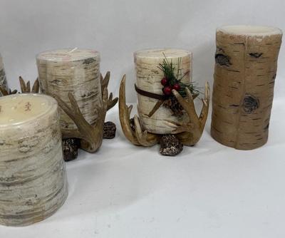 Sale Photo Thumbnail #176: 4 resin antler candle holders and 8 candles: the taller 2 are battery powered, the others are real candles.  Candles are new, all items are in good condition.