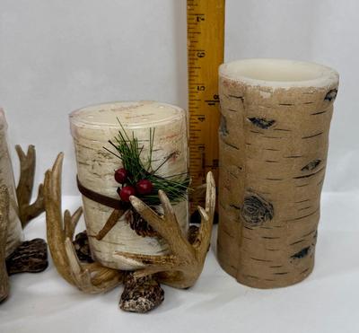 Sale Photo Thumbnail #175: 4 resin antler candle holders and 8 candles: the taller 2 are battery powered, the others are real candles.  Candles are new, all items are in good condition.