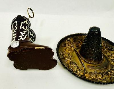 Sale Photo Thumbnail #227: Sombrero marked "MEXICO" but no other markings.  Approx. 4.25" across, boots are approx. 5.5" tall at the top of the holder ring. Both are in good condition.