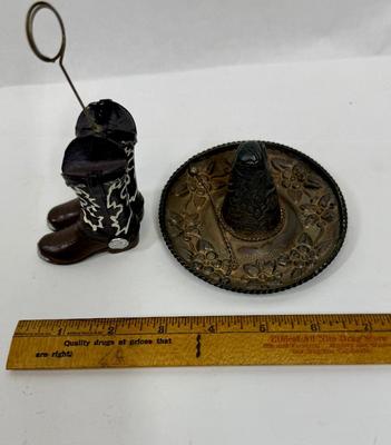 Sale Photo Thumbnail #224: Sombrero marked "MEXICO" but no other markings.  Approx. 4.25" across, boots are approx. 5.5" tall at the top of the holder ring. Both are in good condition.