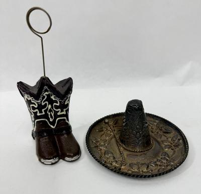 Sale Photo Thumbnail #230: Sombrero marked "MEXICO" but no other markings.  Approx. 4.25" across, boots are approx. 5.5" tall at the top of the holder ring. Both are in good condition.