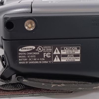LOT 87: Panasonic PV-A207 Palmcorder, Samsung SC-D372 Digital Video Camcorder, Tripod, Cases & More