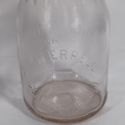 LOT 88: Set of (7) Vintage Milk Bottles
