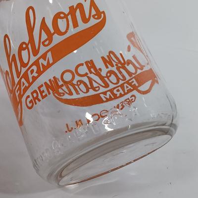 LOT 88: Set of (7) Vintage Milk Bottles
