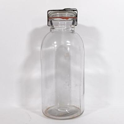 LOT 88: Set of (7) Vintage Milk Bottles