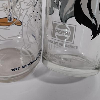 LOT 96: Vintage Galaxy Syrup Bank Bottle, 1977 McDonaldland Captain Crook Glass, Pepe Le Peu Glass & More