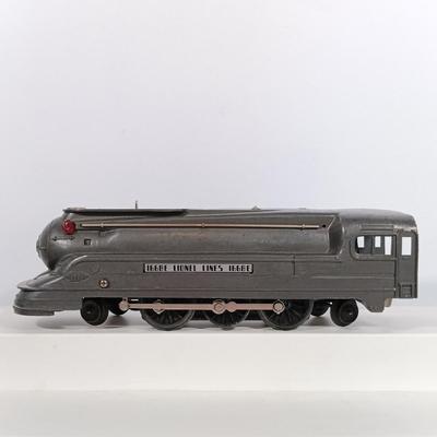 LOT 190: Lionel 1668E O-Gauge Gunmetal Torpedo Steam Locomotive with Tender Car