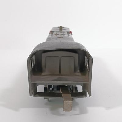LOT 190: Lionel 1668E O-Gauge Gunmetal Torpedo Steam Locomotive with Tender Car