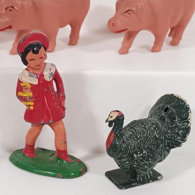 LOT 192: Miniature Lead Cows, Celluloid Pigs, Lead People, Celluloid Duck & More