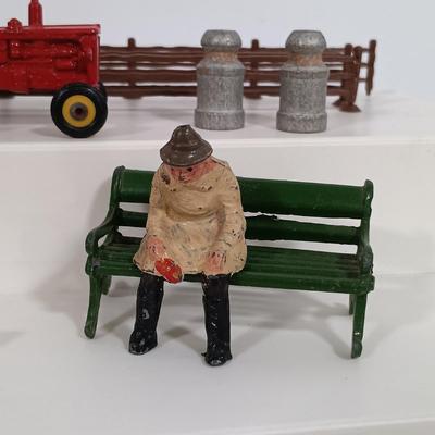 LOT 192: Miniature Lead Cows, Celluloid Pigs, Lead People, Celluloid Duck & More