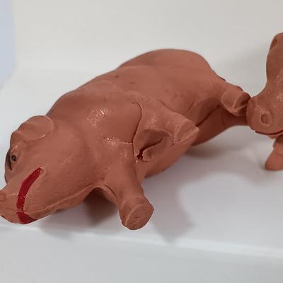 LOT 192: Miniature Lead Cows, Celluloid Pigs, Lead People, Celluloid Duck & More