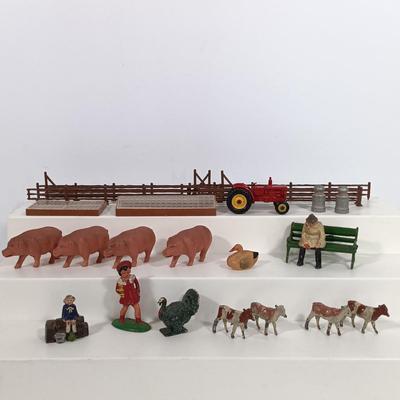 LOT 192: Miniature Lead Cows, Celluloid Pigs, Lead People, Celluloid Duck & More