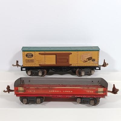LOT 193: Lionel 1682 Red Caboose, 1680 Sunoco Tank Car, Flat Car with Lumber, 1679 Baby Ruth Box Car & More