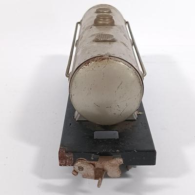 LOT 193: Lionel 1682 Red Caboose, 1680 Sunoco Tank Car, Flat Car with Lumber, 1679 Baby Ruth Box Car & More