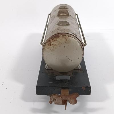 LOT 193: Lionel 1682 Red Caboose, 1680 Sunoco Tank Car, Flat Car with Lumber, 1679 Baby Ruth Box Car & More