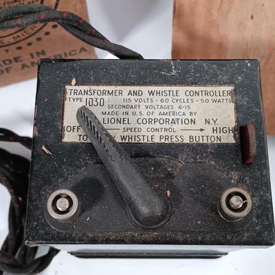 LOT 194: Lionel Type 1030 Transformer, Marx 404 Block Signal, 077 Cross Gate, Control Switches & Metal Track