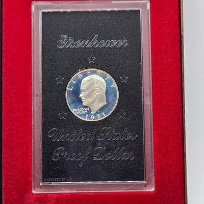 LOT 128: 1971 Eisenhower Silver Proof Dollar, 1972 & 1974 Eisenhower Proof Dollars, 1976 Bicentennial Silver Proof Set, and 1971...