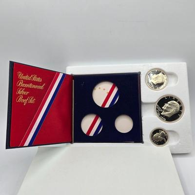 LOT 128: 1971 Eisenhower Silver Proof Dollar, 1972 & 1974 Eisenhower Proof Dollars, 1976 Bicentennial Silver Proof Set, and 1971...