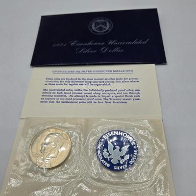 LOT 128: 1971 Eisenhower Silver Proof Dollar, 1972 & 1974 Eisenhower Proof Dollars, 1976 Bicentennial Silver Proof Set, and 1971...