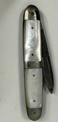 Sale Photo Thumbnail #137: Missing piece of the M-O-P handle, and largest blade does not fully close. See photos for details.