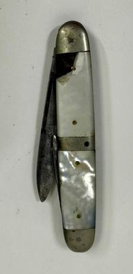 Sale Photo Thumbnail #138: Missing piece of the M-O-P handle, and largest blade does not fully close. See photos for details.