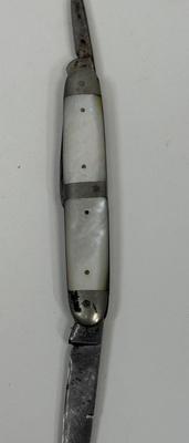 Sale Photo Thumbnail #142: Missing piece of the M-O-P handle, and largest blade does not fully close. See photos for details.