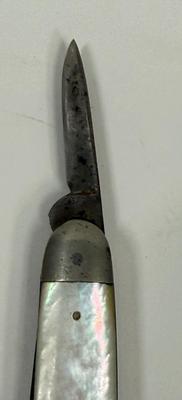 Sale Photo Thumbnail #139: Missing piece of the M-O-P handle, and largest blade does not fully close. See photos for details.