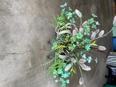 Sale Photo Thumbnail #88: Large greenery arrangement on metal stand