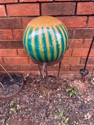 Sale Photo Thumbnail #238: Green/gold clay decorative ball with heavy iron stand