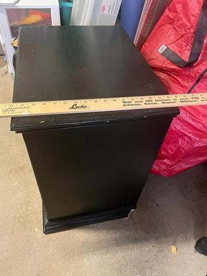 Sale Photo Thumbnail #290: Black open-shelf nightstand - some minor scratches and small damage on back corner but otherwise a good, heavy storage stand