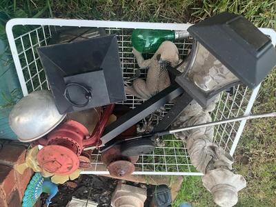 Sale Photo Thumbnail #299: Large wire basket with lots of misc garden décor