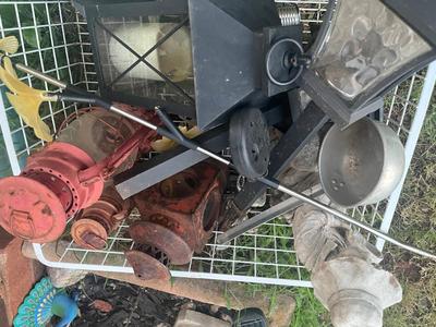Sale Photo Thumbnail #300: Large wire basket with lots of misc garden décor
