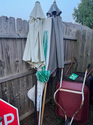 Sale Photo Thumbnail #310: Several large patio umbrellas, all with poles