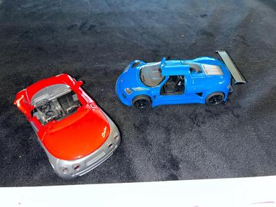 Sale Photo Thumbnail #397: Die Cast cars, not Hot Wheel size - scale of red car 1/32, blue 1/36