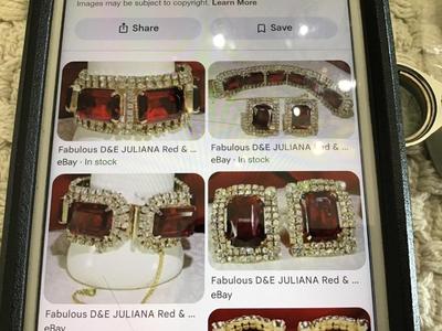Found similar on eBay and Etsy stating it is. Please do your research Gorgeous DE Juliana Red Clear Rhinestone Set
