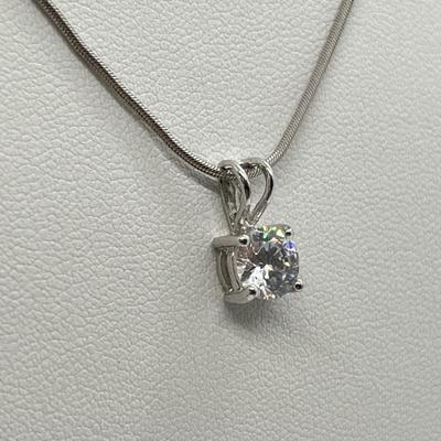 LOT 62: White Gold 18" Necklace w/ Sterling Silver and CZ Pendant