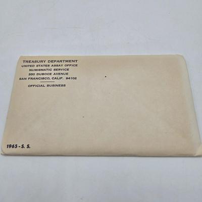 LOT 122: U.S. Mint Uncirculated Coin Sets from 1965, 1969, 1972, 1975