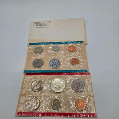 LOT 122: U.S. Mint Uncirculated Coin Sets from 1965, 1969, 1972, 1975