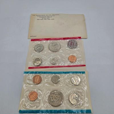LOT 122: U.S. Mint Uncirculated Coin Sets from 1965, 1969, 1972, 1975