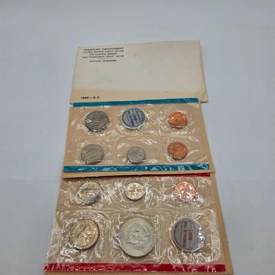 LOT 122: U.S. Mint Uncirculated Coin Sets from 1965, 1969, 1972, 1975