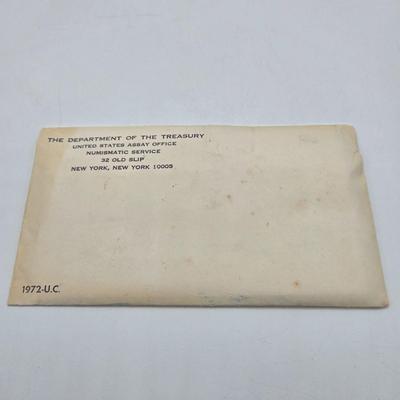 LOT 122: U.S. Mint Uncirculated Coin Sets from 1965, 1969, 1972, 1975