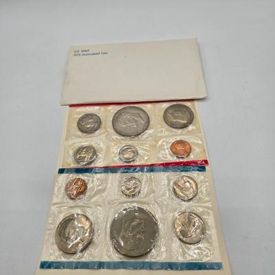 LOT 122: U.S. Mint Uncirculated Coin Sets from 1965, 1969, 1972, 1975