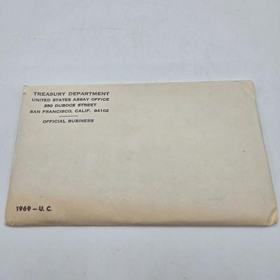 LOT 123: U.S. Mint Uncirculated Coin Sets from 1965, 1968, 1969, 1972