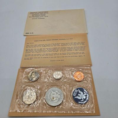 LOT 123: U.S. Mint Uncirculated Coin Sets from 1965, 1968, 1969, 1972
