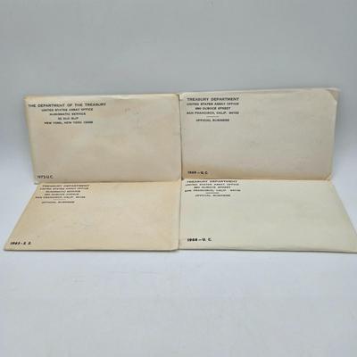 LOT 123: U.S. Mint Uncirculated Coin Sets from 1965, 1968, 1969, 1972