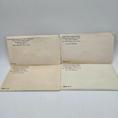 LOT 123: U.S. Mint Uncirculated Coin Sets from 1965, 1968, 1969, 1972