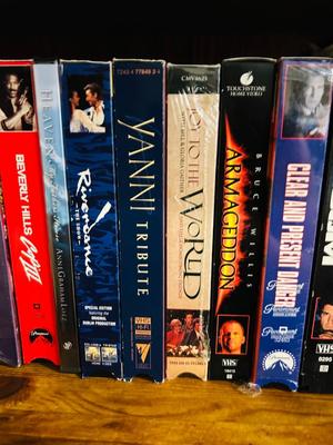 QUASER 4 HEAD VCR AND A GREAT ASSORTMENT OF VHS MOVIES