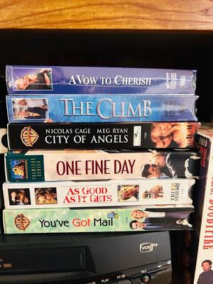 QUASER 4 HEAD VCR AND A GREAT ASSORTMENT OF VHS MOVIES